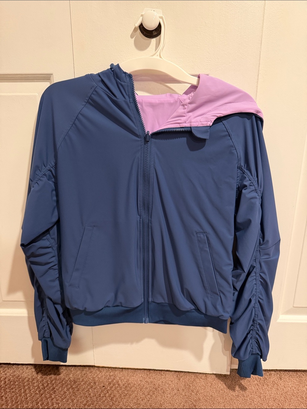 Fabletics Blue Bomber Jacket with Pink Hood Lining